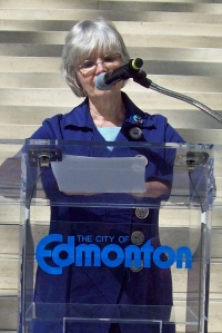 Alice Major, Edmonton's first poet laureate welcomes the PoeTrainers to the Edmonton Poetry Festival event at City Hall.